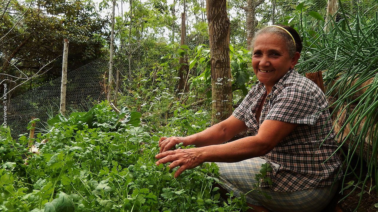 Farmer in her home garden